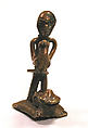 Gold Weight: Male with Bird, Brass, Akan peoples