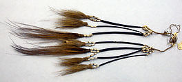 Tassels, Cassowary feathers, cassowary quills, seeds, fiber, Asmat people