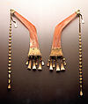 Batling (men’s ear ornaments), Ilongot artist, Hornbill ivory, metal, pearl shell, glass beads, Ilongot people