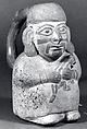 Stirrup Spout Bottle with Figure, Ceramic, slip, pigment, Moche