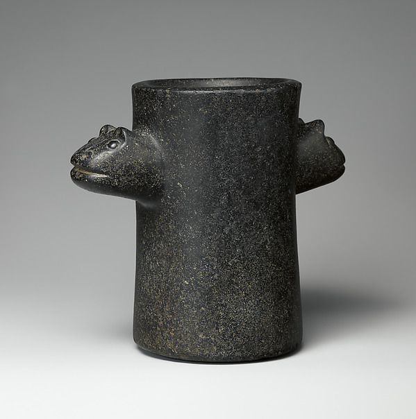 Beaker with animal heads