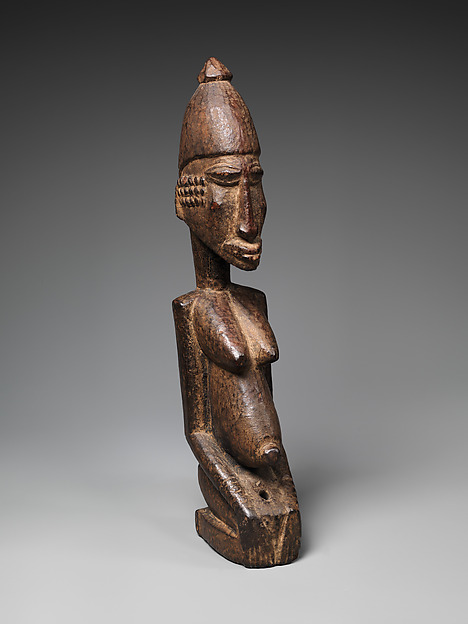 Figure of a Kneeling Woman