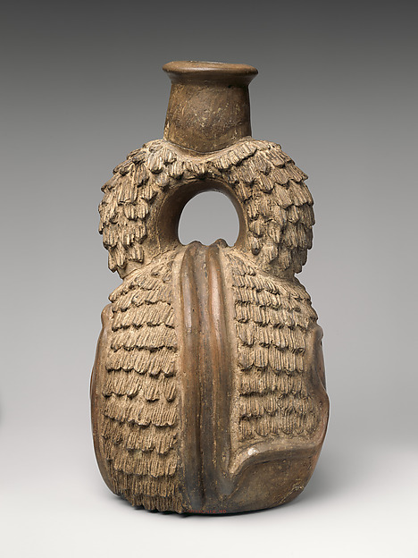 Stirrup-spout bottle