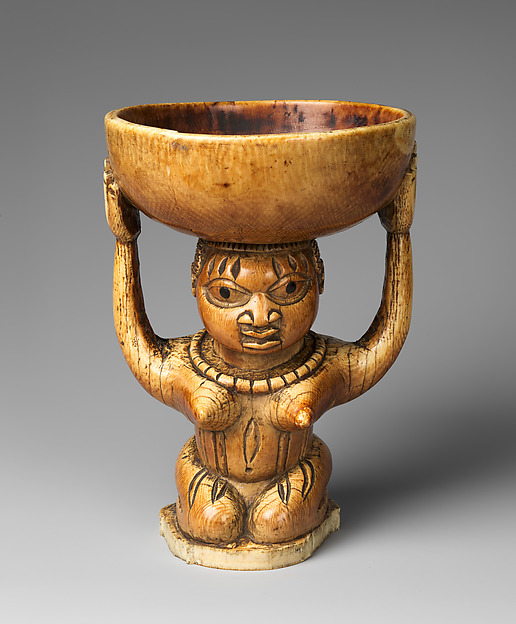 Àgéré Ifá (Ifá divination vessel) with kneeling woman