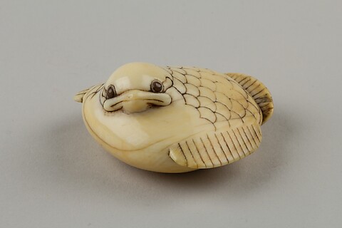 Masatami - Netsuke of a Female Monkey Holding a Nut while her Baby