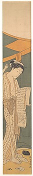 Woman in Night Robe Reading a Letter
