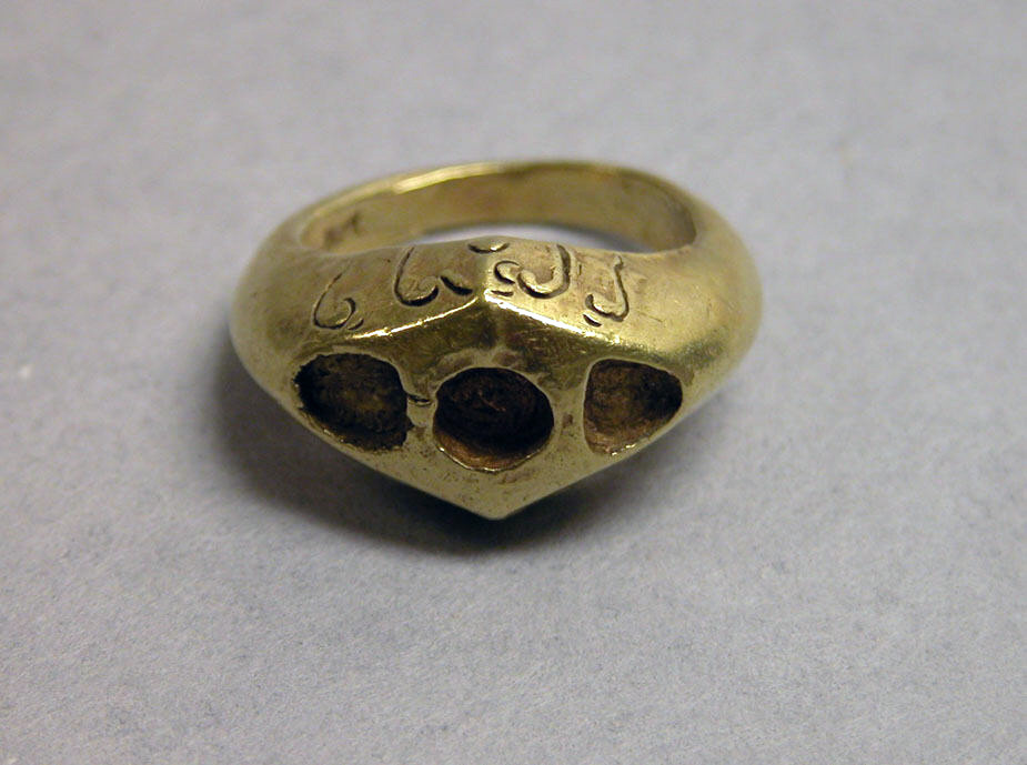 Ring with Lozenge Shaped Bezel and O J  Inscription 