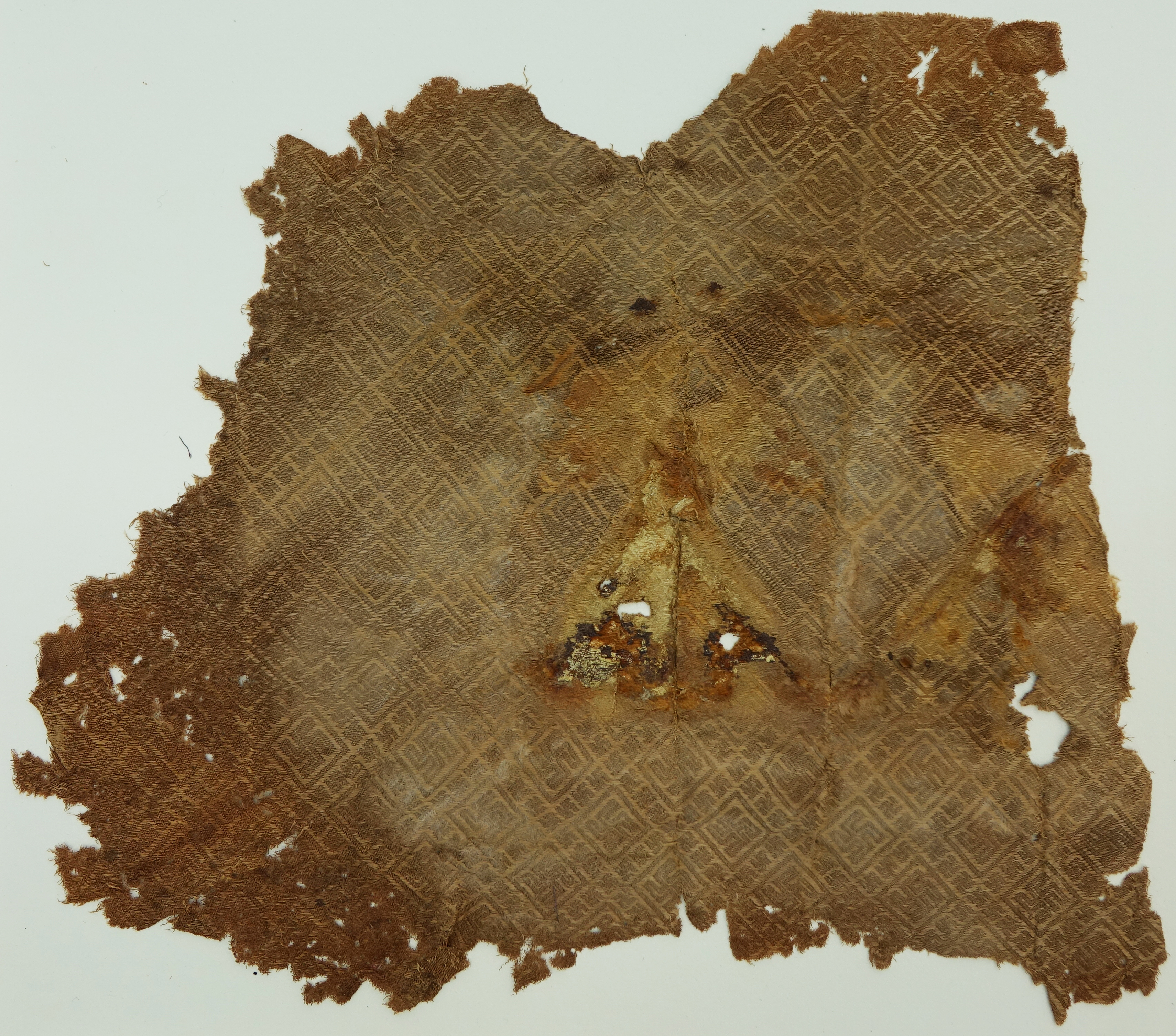 Textile fragment with swastika pattern