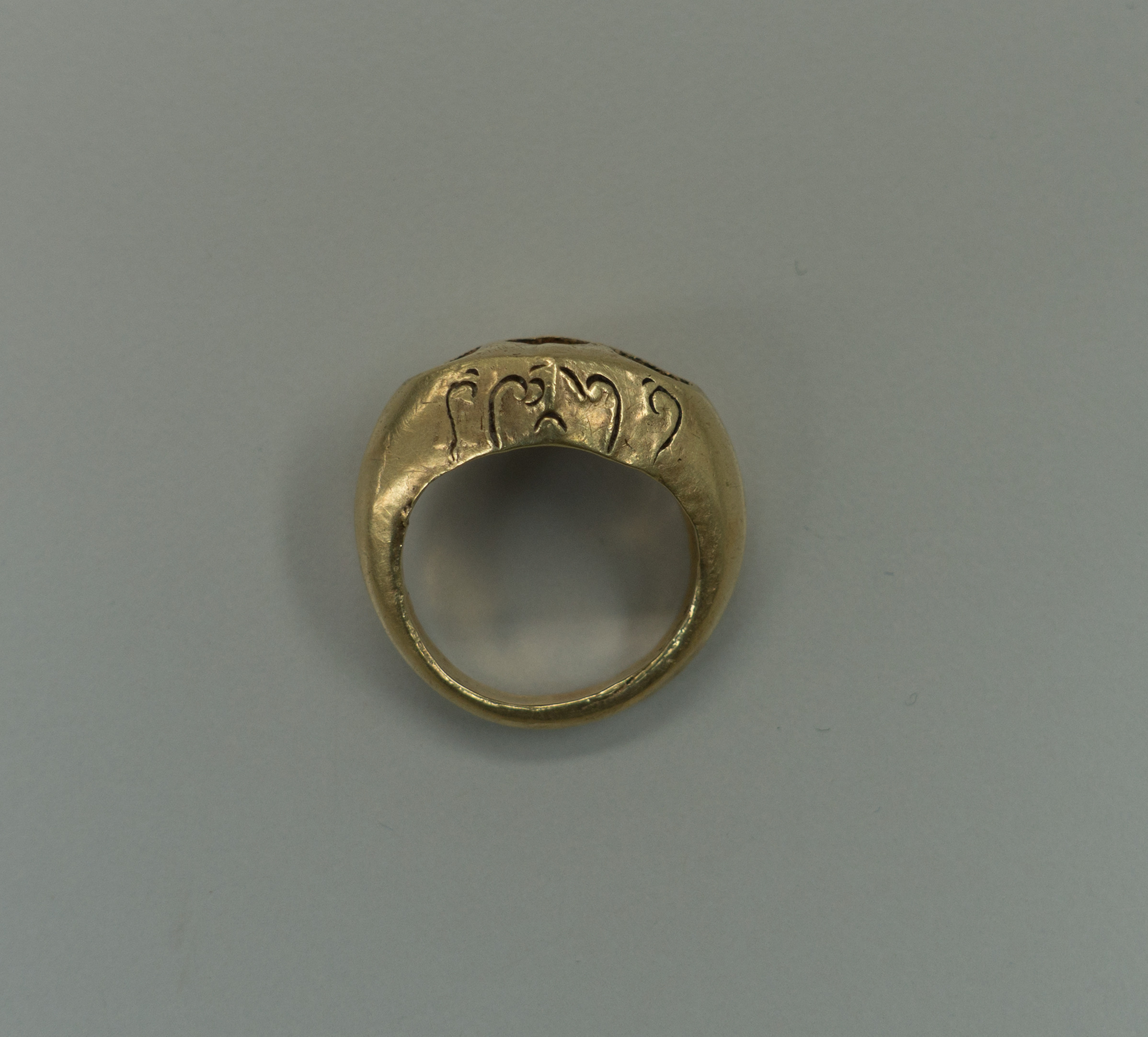 Ring with Lozenge Shaped Bezel and O J  Inscription 