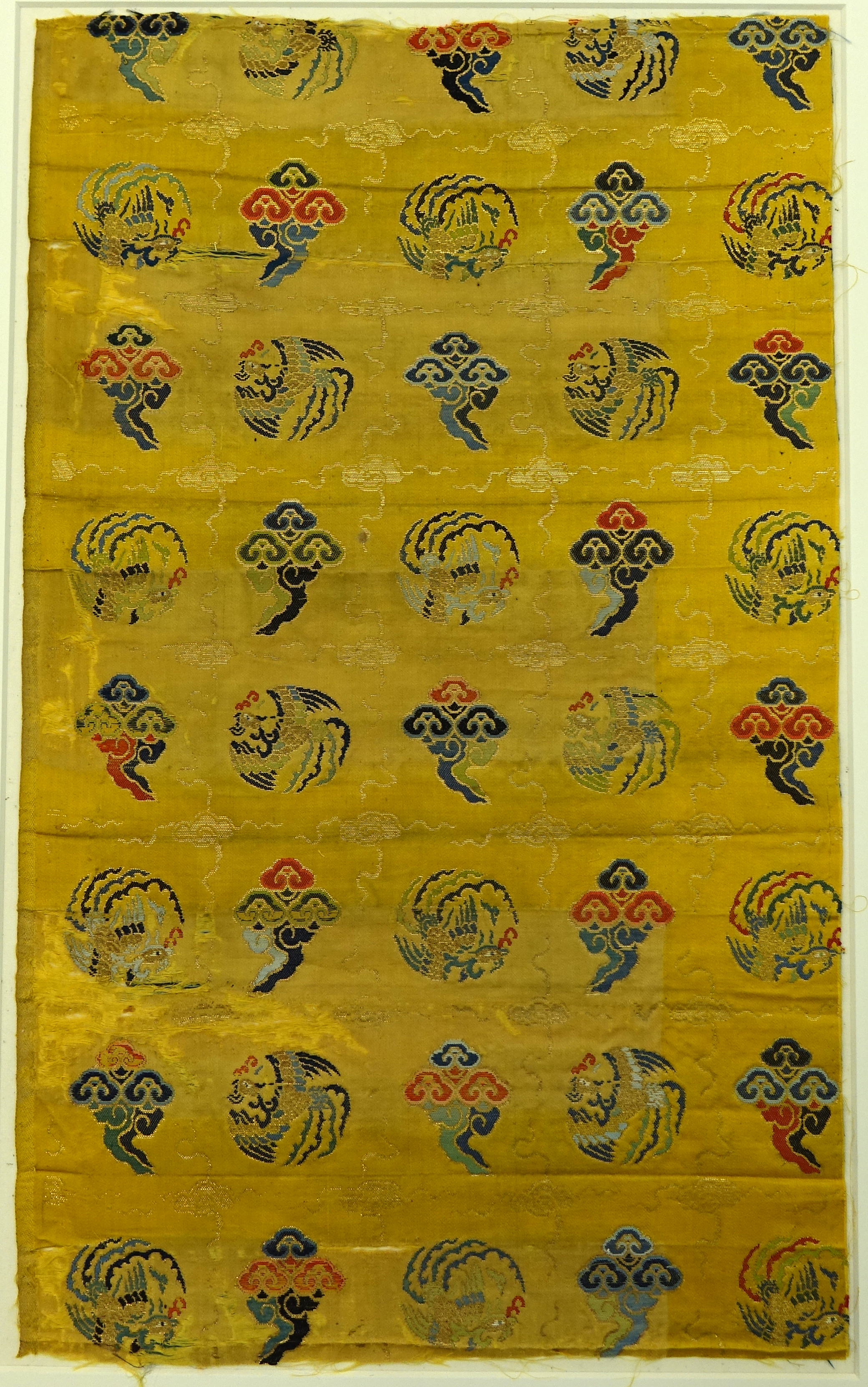 Textile fragment with phoenix medallions
