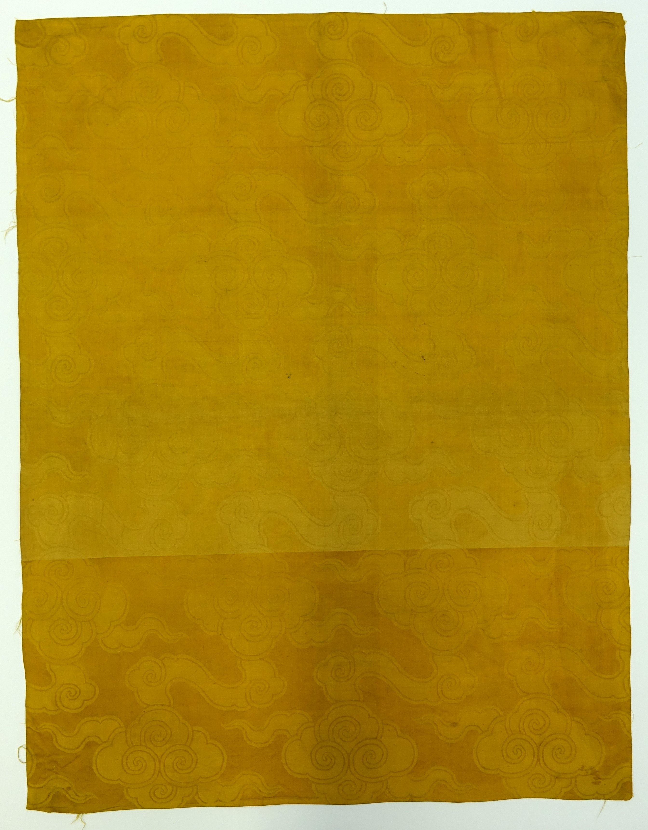 Textile fragment with clouds