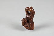 Netsuke of Ōni (Demon) Weeping Beside Giant Arm of Demon, Wood, Japan