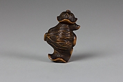 Tanuki in a Lotus Leaf, Matsuda Sukenaga (Japanese, 1800–1871), Wood, Japan