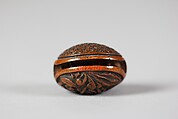 Netsuke in the form of a Nut Containing a Carved Landscape, Wood, Japan