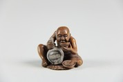 Netsuke of a Man Holding a Small Bottle in One Hand and Drinking from a Cup, Wood, Japan