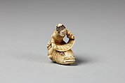 Netsuke of the Sage, Kinkō Carrying a Scroll and Seated on a Carp, Ivory, Japan