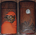 Case (Inrō) with Portrait of Daruma (obverse); Large Lotus Leaf and Stalk with Seed Pod (reverse), Brown wood, gold, brown and red hiramakie, pewter inlay, inlaid eyes; Interior: plain, covered box, Japan