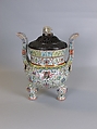 Tripod incense burner with Buddhist auspicious symbols, Porcelain painted in overglaze polychrome enamels (Jingdezhen ware), wooden cover with jade knob, China