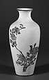 Vase with flowers, Porcelain painted in overglaze polychrome enamels over a white sgraffito ground of vegetal scrolls (Jingdezhen ware), China