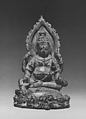 Seated Four Armed Jambhala, the Buddhist God of Wealth, Bronze with silver inlay, Indonesia (Java)