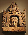 Antefix with Head of a Male Deity, Terracotta, Indonesia (Java)