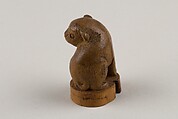 Netsuke: Seal in the Form of a Seated Pug-Dog, Bamboo root, Japan