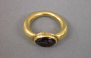 Ring with Dark Red Inset Oval-Shaped Stone, Gold with red inset stone, Indonesia (Java)