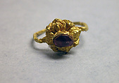 Ring with Purplse Stone set in Lotus Mount, Gold with purple stone, Indonesia (Java)