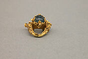 Ear Clip with Aqua-Green Stone in Foliate Pattern Mount, Gold with aqua-green stone, Indonesia (Java)