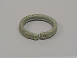 One from a Pair of Solid Open Bangles with Two Rows of Concentric Circles, Bronze, Thailand