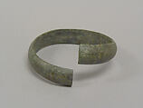 One from a Pair of Undecorated Torqued Anklets, Bronze, Thailand