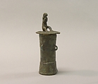 Lime Container in the Form of a "Mloko" Drum Surmounted by a Crouching Figure, Bronze, Indonesia (Java, Lumajang, Pasiran)