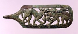 Belt Hook with Wolf and Dzo, Bronze with traces of gilding, Northwest China