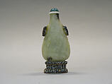 Snuff Bottle, Gray nephrite with black lion mask handles, blue and white stopper, silk stand, China