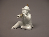 Boy Blowing a Horn, White porcelain with incised decoration and gold (Hirado ware), Japan