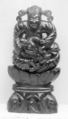Seated Figure Holding a Child, Amber, China