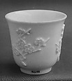 Cup, Porcelain with low-relief decoration under a clear glaze, Dehua ware (blanc de chine), China