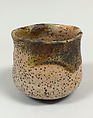 Teabowl, Clay, glaze, finely crackled and strongly pitted (Raku ware), Japan