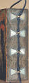 Case (Inrō) in the Shape of Wood Seal with Decoration of Pheonix and Paulownia Tree, Lacquer with red, black green, brown, and white painted lacquer 
on gray ground
Ojime: kingfisher on lotus stem; wood, stained ivory and mother-of-pearl inlay
Netsuke: yamabushi and wood gatherers, Japan