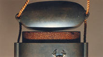 Case (Inrō) with Design of Spring Fern and Horsetail (obverse); Deer (reverse), Ogawa Haritsu (Ritsuō) (Japanese, 1663–1747), Ceramic, mother-of-pearl, pewter on brown lacquer with sprinkled gold
Ojime: bead; agate
Netsuke: ivory and wood, Japan