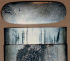Case (Inrō) with Design of Sage beside a Waterfall (obverse); Tiger beside Rocks and Maple Tree (reverse), Metal, brass, sentoku metal, incised, openwork, various applied metals
Interior: silver metal, Japan