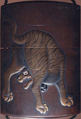 Case (Inrō) with Design of Tiger Seen from Behind, Lacquer, shibuichi coloured ground, gold, silver and red hiramakie, inlaid eye; Interior: red lacquer & silver fundame, Japan
