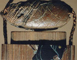 Case (Inrō) with Design of Samurai with Large Hat Beside a Weeping Willow, Wood, natural brushed wood, black and gold hiramakie, ceramic inlay; Interior: plain, Japan