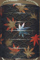 Case (Inrō) with Design of Maple Leaves on Conventionalized Waves, Sprinkled gold and silver lacquer with inlaid mother-of-pearl; ojime is nut carved with dragon motifs; netsuke is dancer carved in wood with ivory bugaku mask; Interior: nashiji, fundame and roiro, Japan