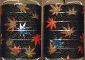 Case (Inrō) with Design of Maple Leaves on Conventionalized Waves, Sprinkled gold and silver lacquer with inlaid mother-of-pearl; ojime is nut carved with dragon motifs; netsuke is dancer carved in wood with ivory bugaku mask; Interior: nashiji, fundame and roiro, Japan