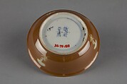 Dish with mythical beast qilin (one of a pair), Porcelain with white slip decoration and brown glaze (Jingdezhen ware), China