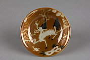 Dish with mythical beast qilin (one of a pair), Porcelain with white slip decoration and brown glaze (Jingdezhen ware), China