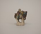 Minature figure of a lion and rider, Earthenware with three color (sancai) glaze, China