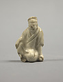 Figure of a Seated Man, White glazed porcelaneous ware, China
