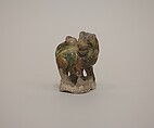 Minature figure of a lion, Earthenware with three color (sancai) glaze, China